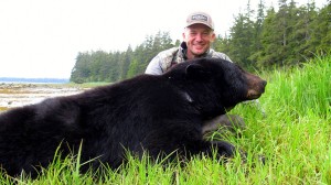 Randy Newberg with bear in Alaska